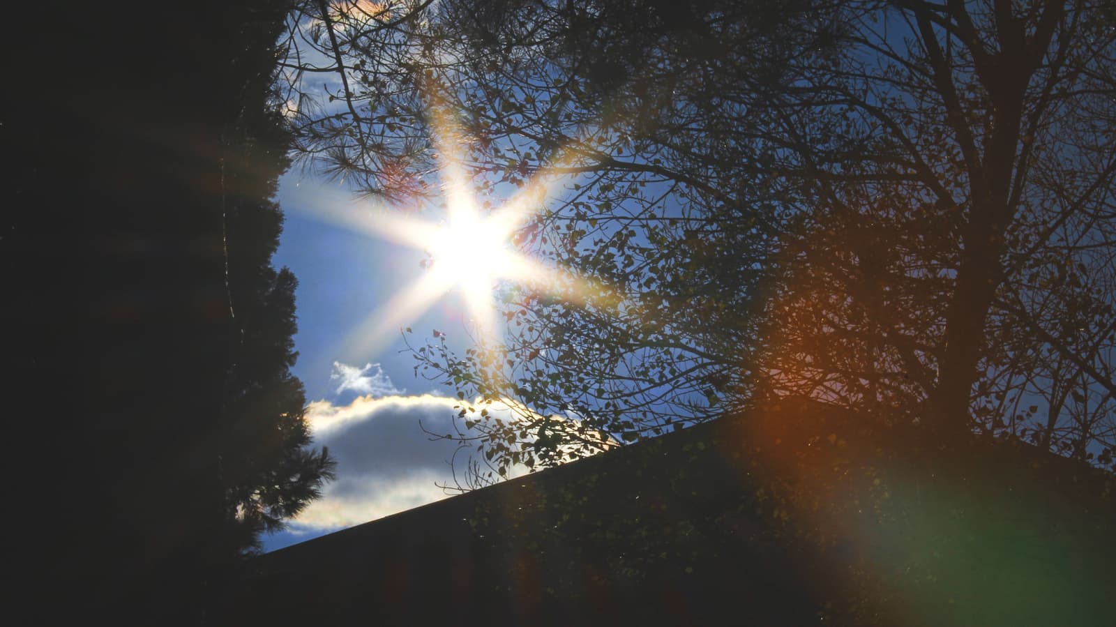 A bright hot sun in a clear blue sky