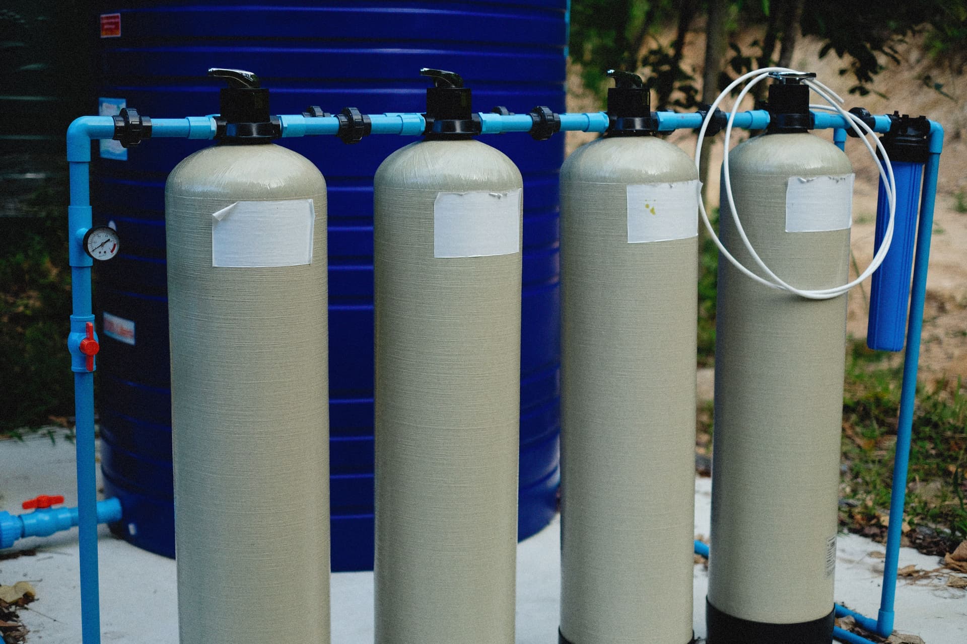 Water filtration tanks with blue piping