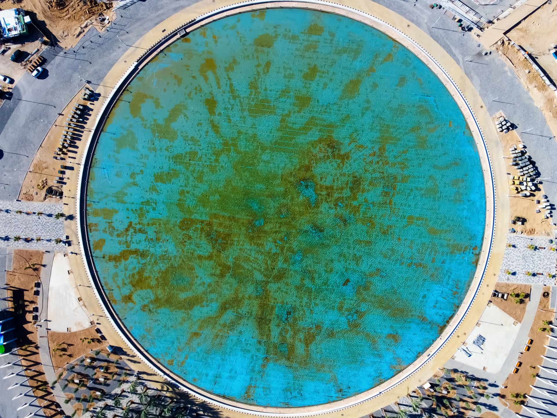 An aerial view of a large round pool