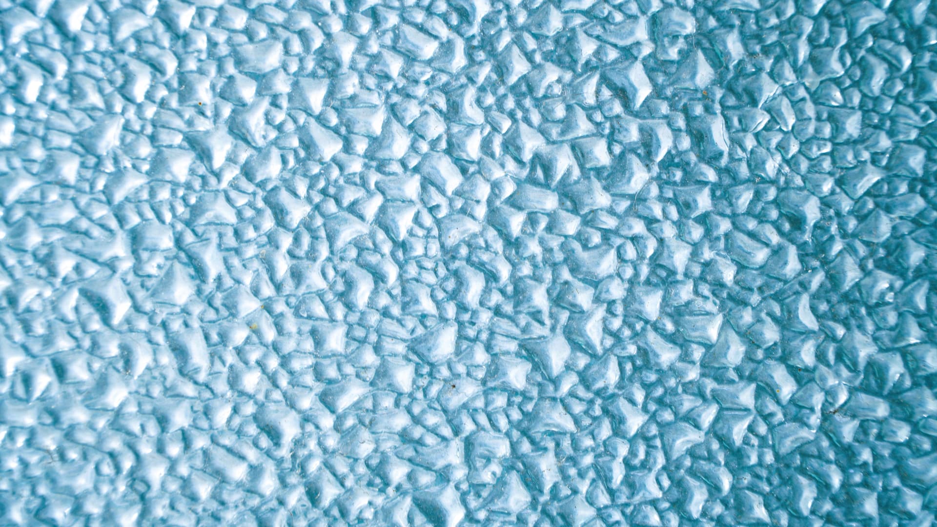 A textured blue ice surface