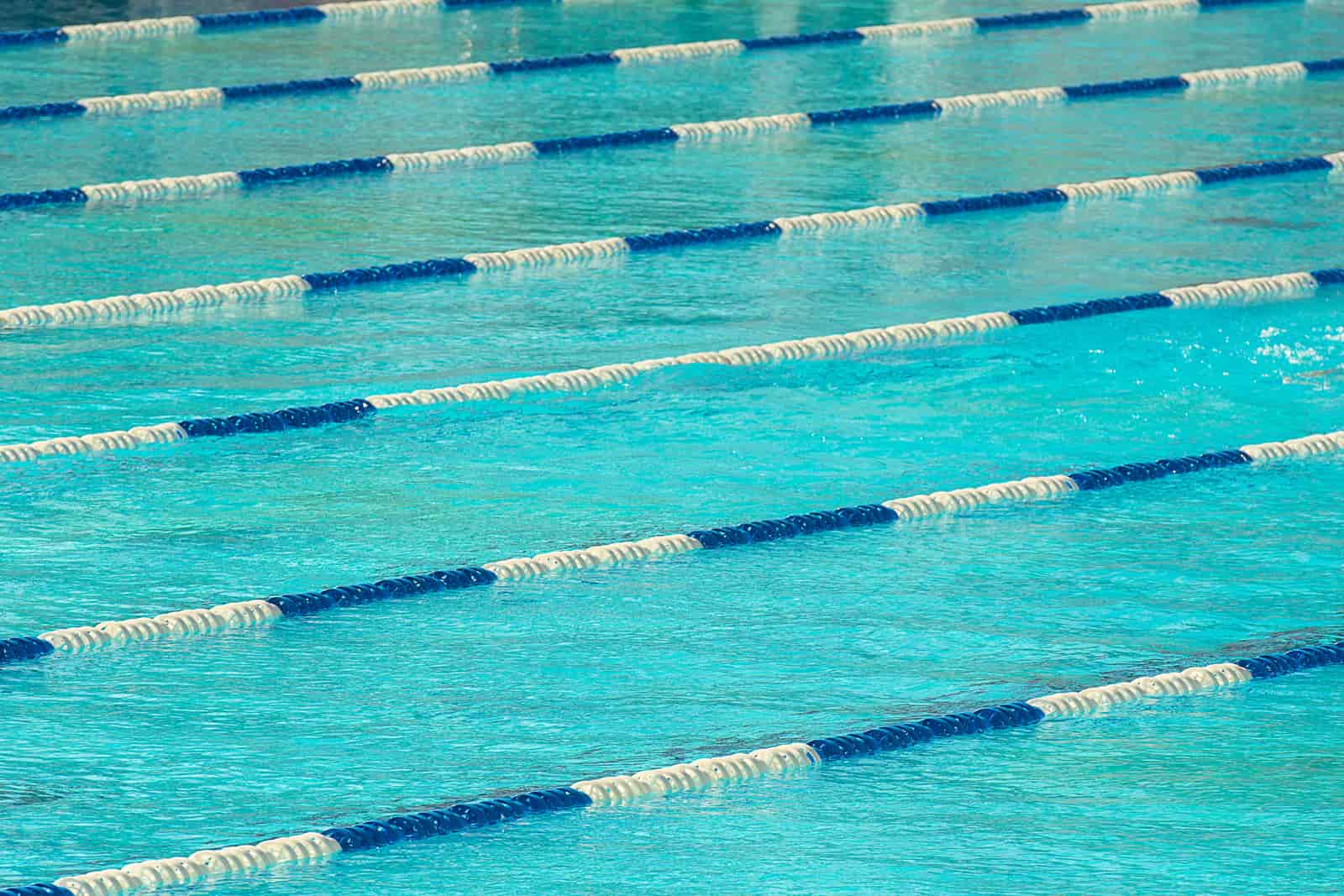 A public swimming pool with lane markings