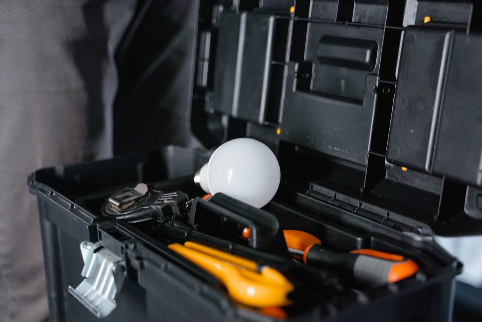 A repair kit with patches and tools laid out on a surface