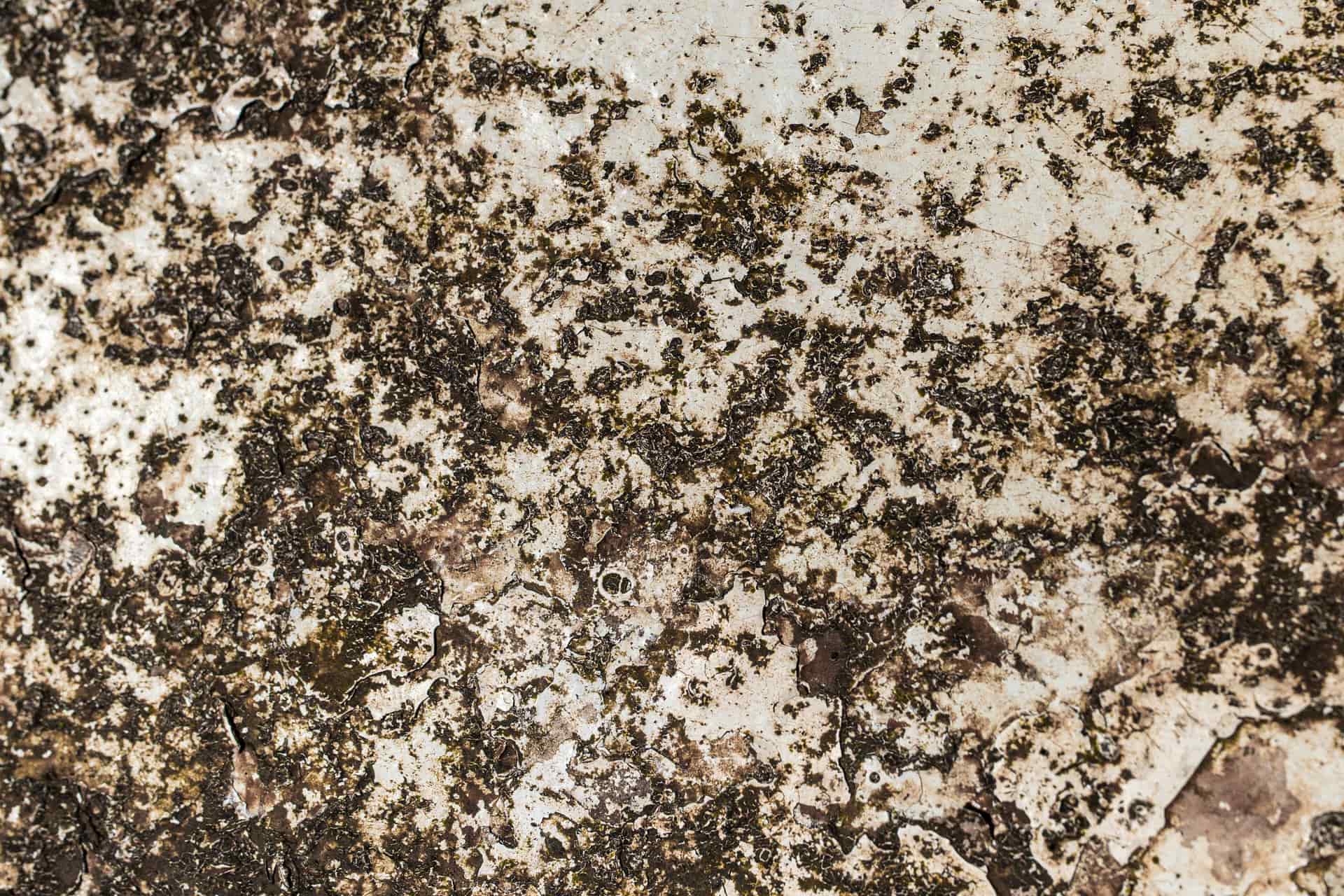A rust-stained metal surface showing orange-brown discoloration
